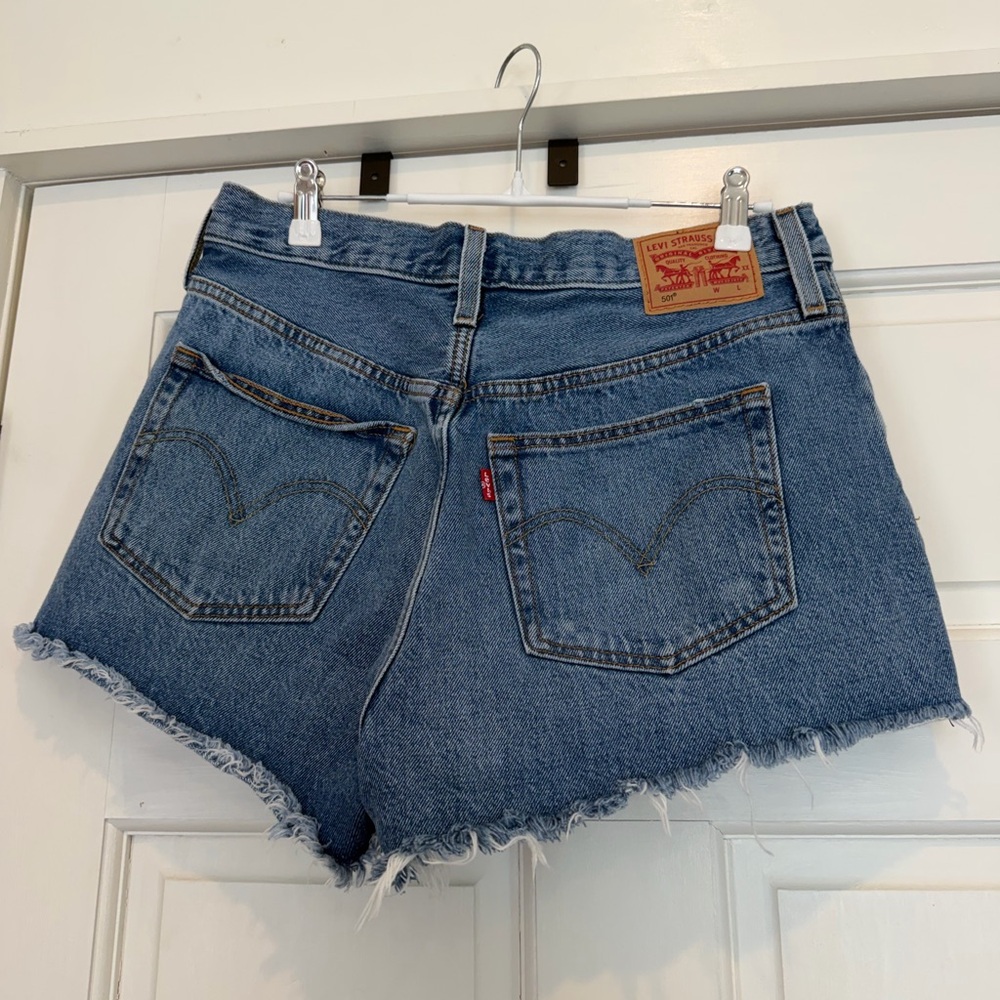Levi's Distressed Blue Denim Cutoff Shorts - Picture 3 of 6